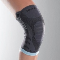 Elastic knee support with flexible lateral reinforcements 1